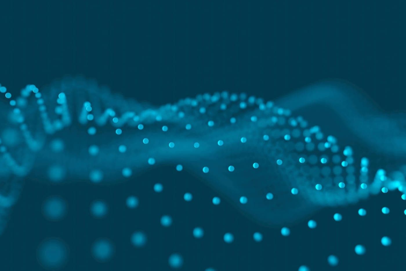 A flowing wave of many glowing teal dots forming a coordinated field on a dark teal background